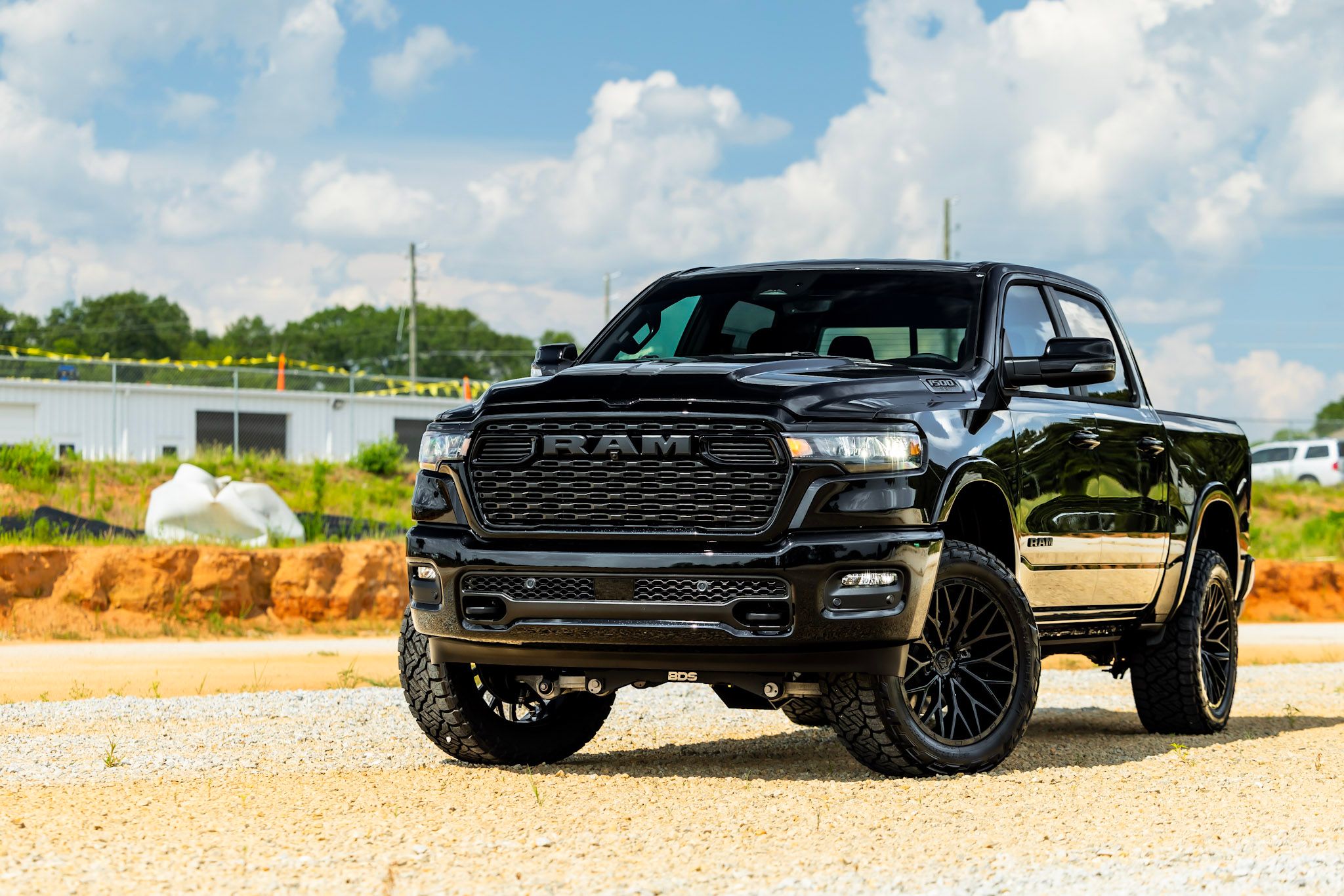 Lifted trucks at Akins