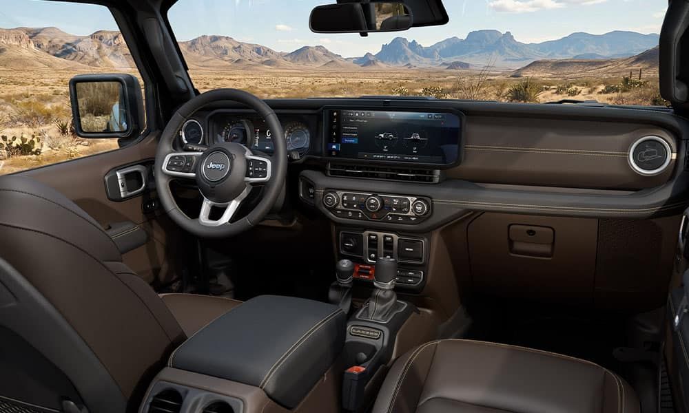 What are the design elements of the Wrangler Laredo's interior?