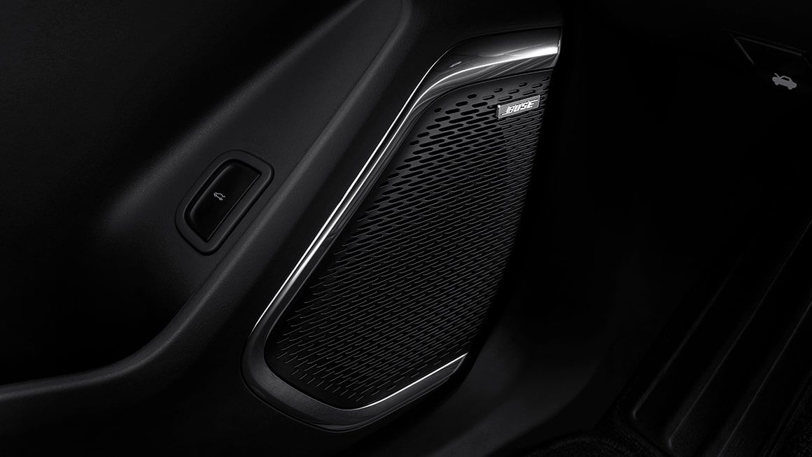 Why should I opt for the Enhanced Driving Package with my Traverse?